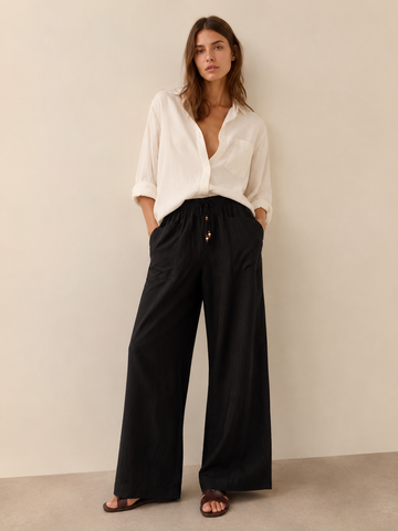Wide-Leg Linen Blend Trousers
Effortlessly refined with a relaxed silhouette,