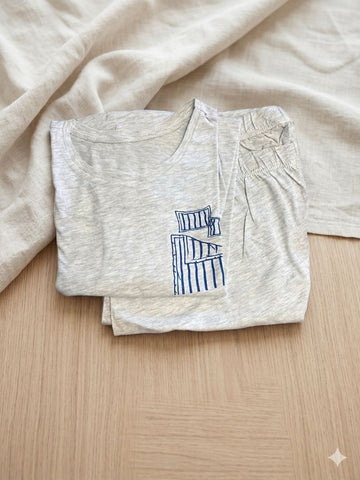 Unwind in style with this ultra-soft grey marl pajama set.