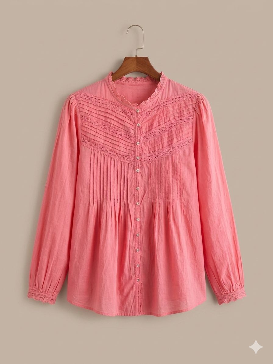 Down Blouse
This elegant Zara blouse in a soft salmon pink (simone)