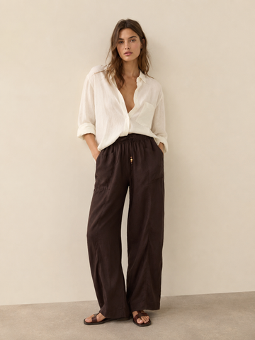 Wide-Leg Linen Blend Trousers
Effortlessly refined with a relaxed silhouette, these wide-leg trousers are crafted from a breathable viscose and linen blend for a soft feel and natural texture.